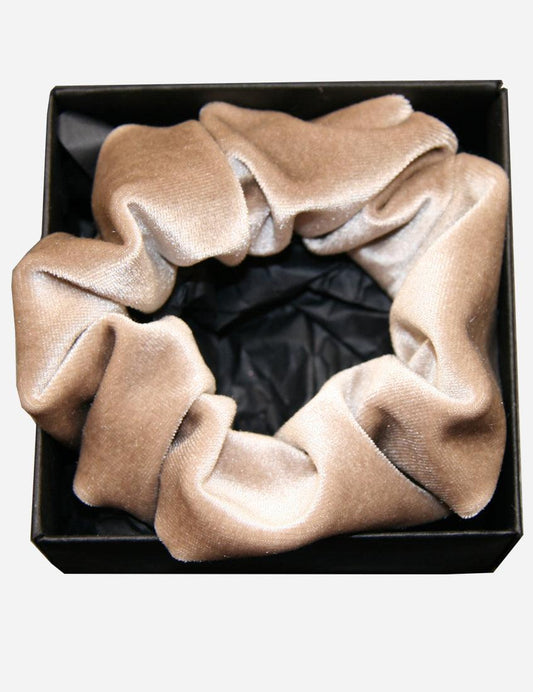 Elegant taupe headband with a silky finish displayed in a black box, a luxurious hair accessory for sophisticated styling.