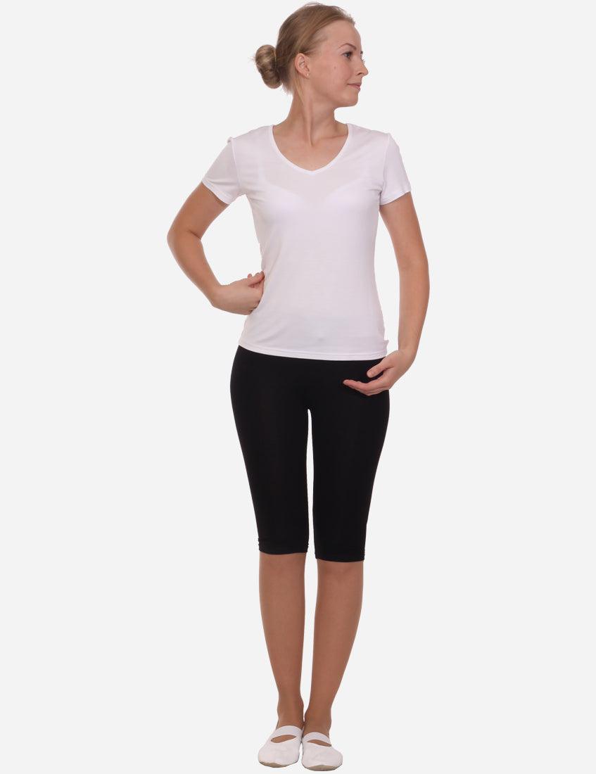 Woman in white V-neck t-shirt and black leggings, casual style, looking to the side, on a white background