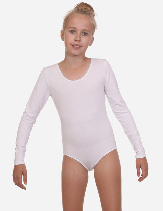 Confident young gymnast in a long-sleeved white leotard posing against a clean background.