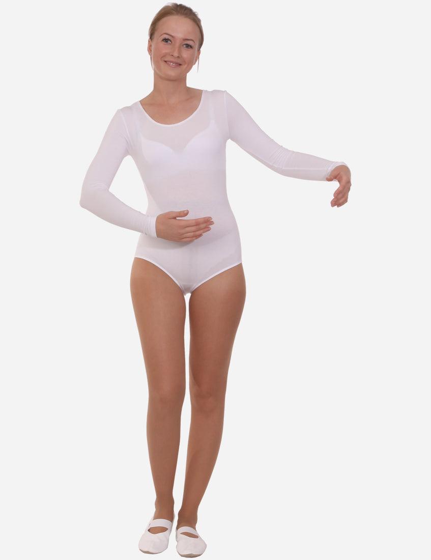 Adult female dancer in a white sports leotard with long sleeves performing a dance pose.
