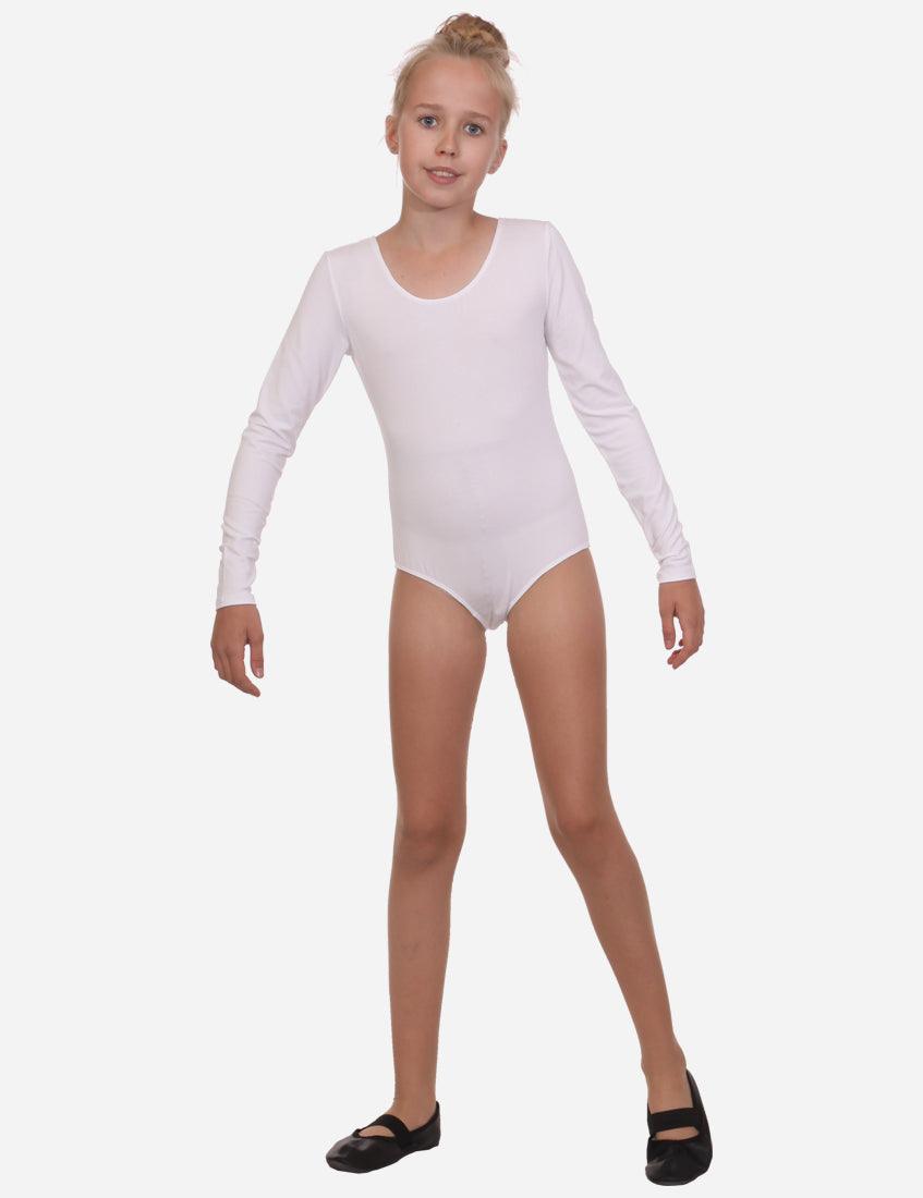 Full body shot of a young gymnast in a white leotard with long sleeves, ready to perform.